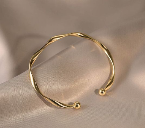 Χρυσή χειροπέδα στριφτή 14 καράτια